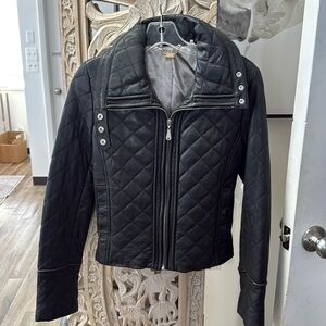 Never worn. DOMA black quilted leather jacket